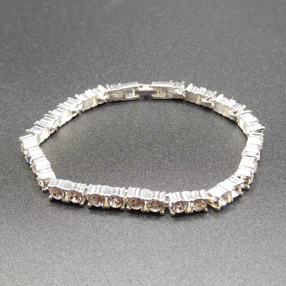 CZ Rhinestone Tennis Style Bracelet, Silver Tone, 7 1/4 Inches - Picture 5 of 7